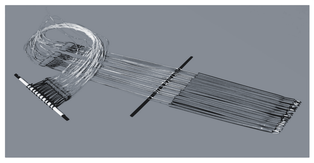 Jacquard healds with elastic element